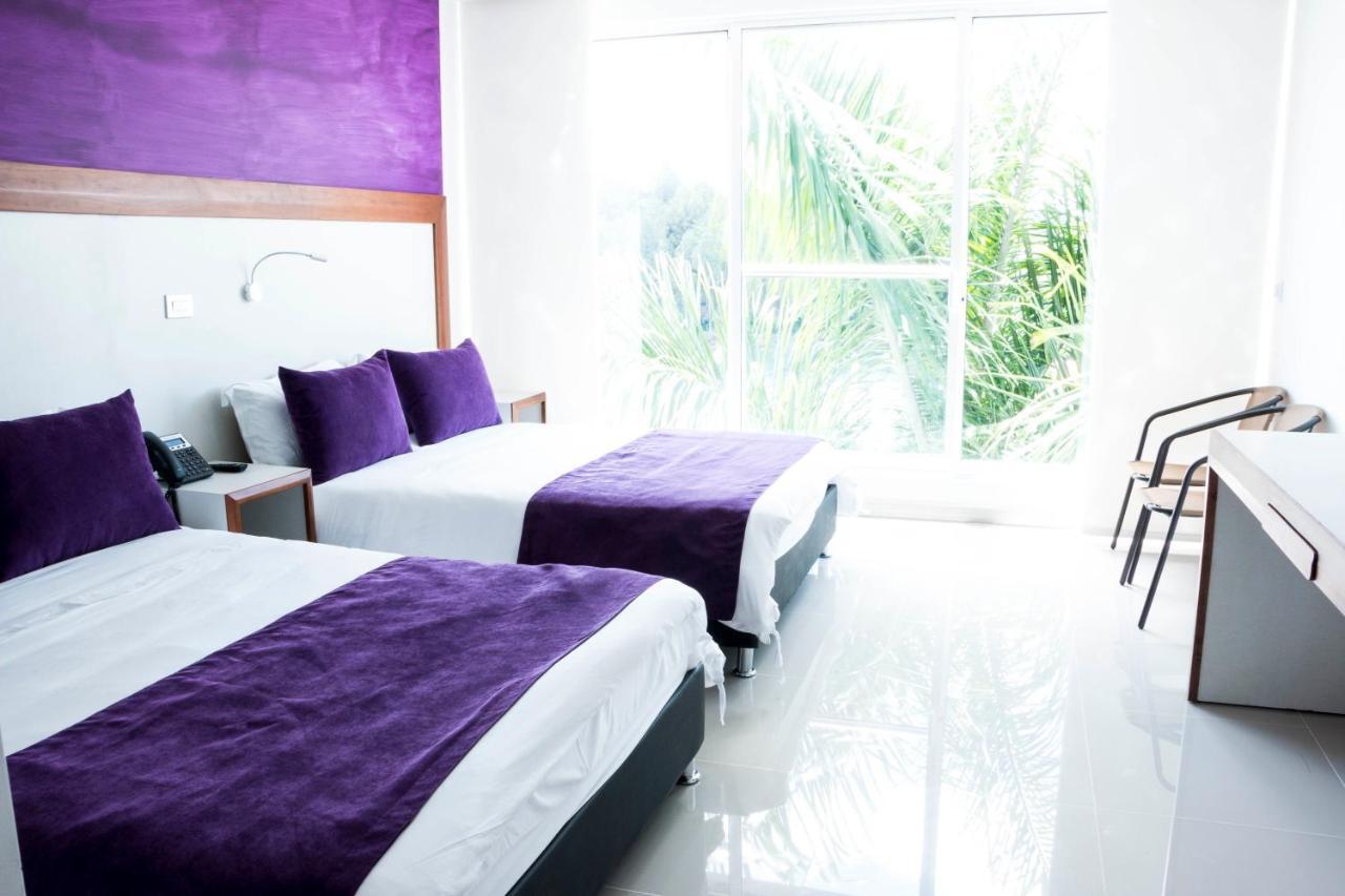 Hotel Los Recuerdos Guatapé エクステリア 写真 A room at the hotel